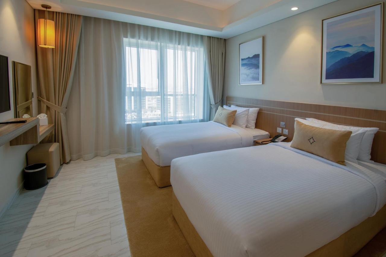 Premium Two-Bedroom Apartment Inclusive of complimentary shuttle bus to Deira City Centre & Dubai Festival City Mall