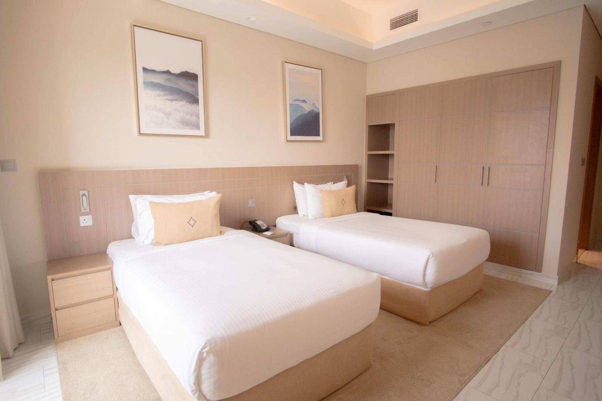 Premium Two-Bedroom Apartment Inclusive of complimentary shuttle bus to Deira City Centre & Dubai Festival City Mall